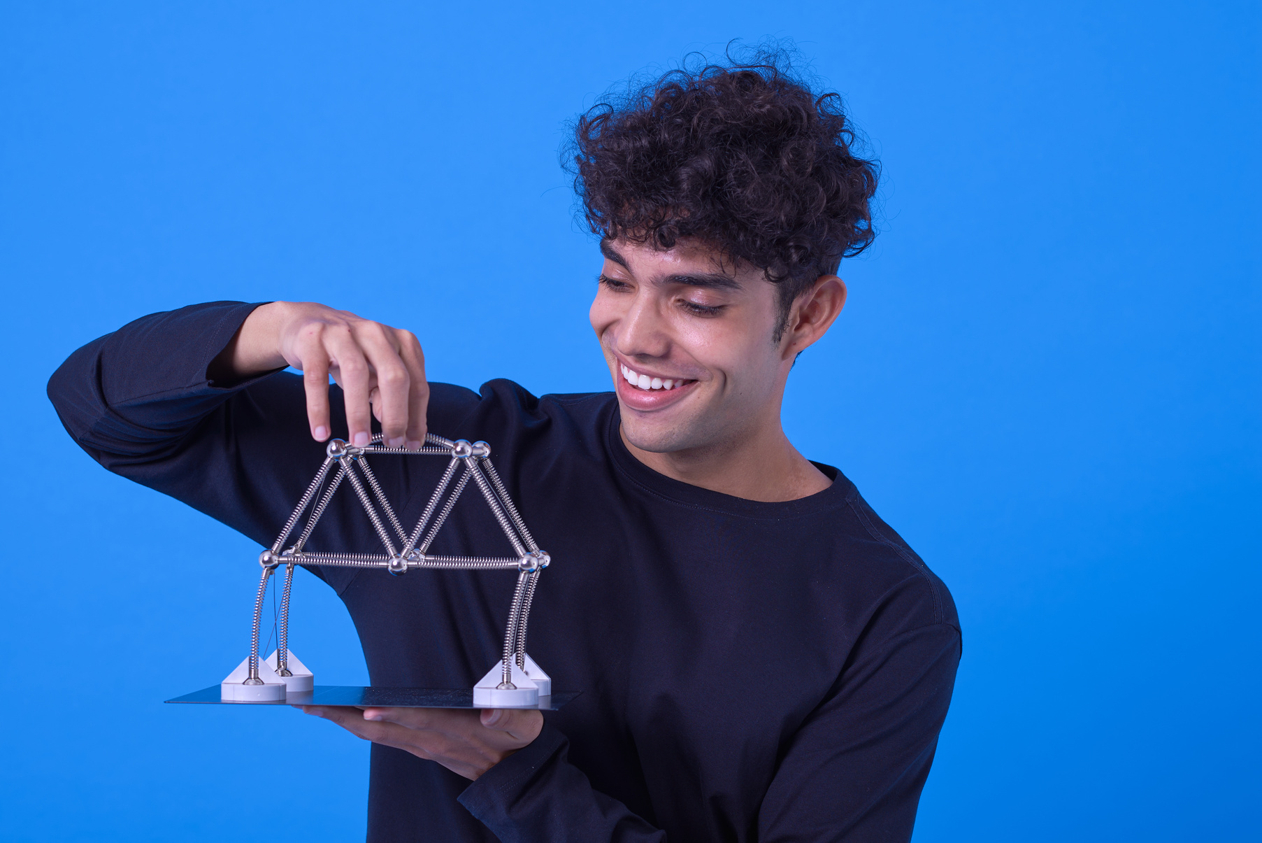 Bold & Punchy Headshots Man with a Mechanical Model